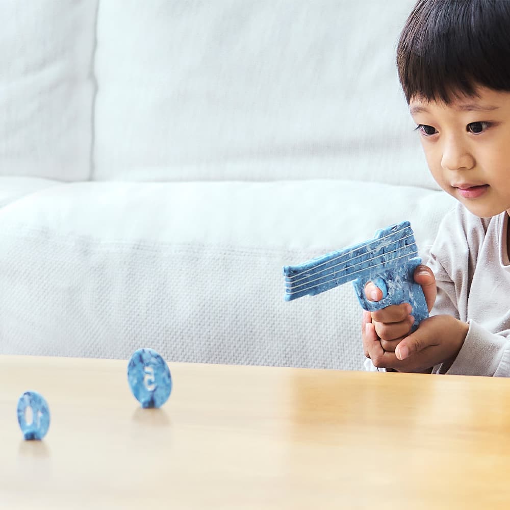 A Rubber Band Gun With a Message — The Peace Gun